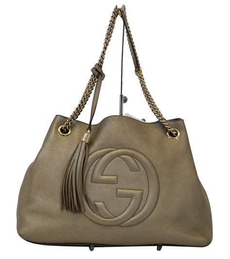 does gucci use real gold on bags|gucci bag gold chain.